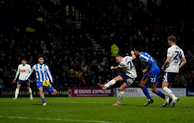 Preston North End's Milutin Osmajic (centre) scores