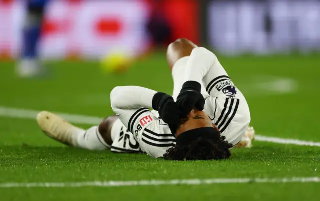 Fulham's Kevin reacts after sustaining an injury