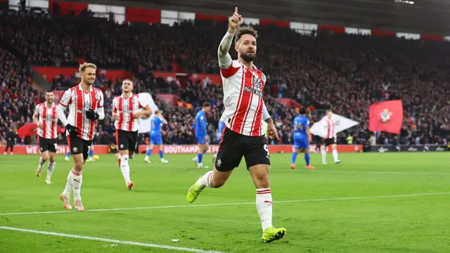 Adam Armstrong runs off in celebration after scoring for Southampton