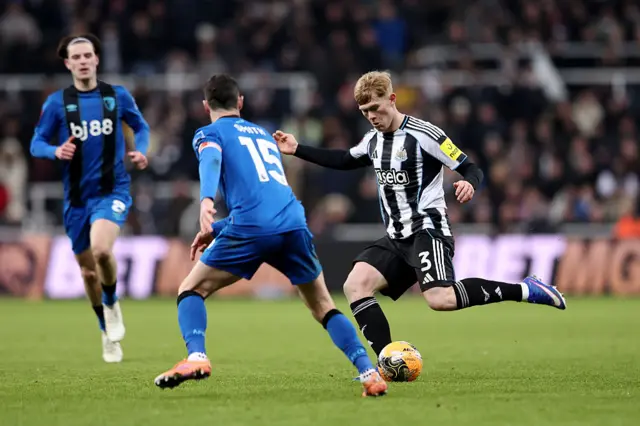 Lewis Hall crosses the ball