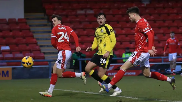Calum Agius fires Crewe into the lead against Harrogate