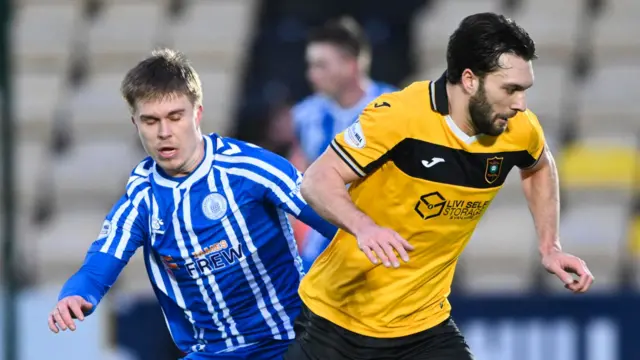 Kilmarnock's Michael Schjonning-Larsen and Livingston's Connor McLennan