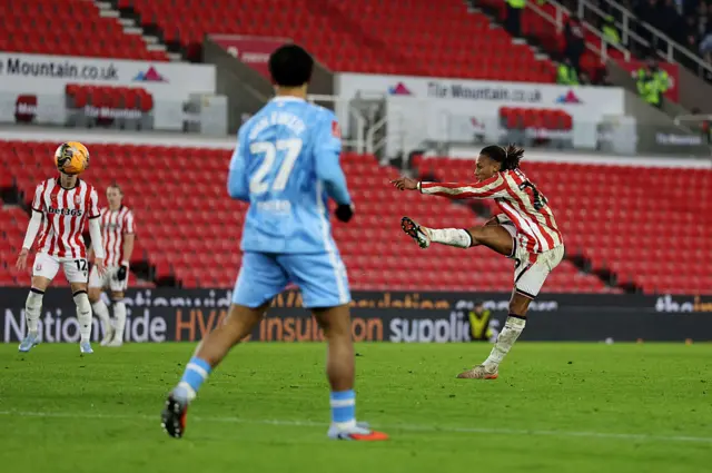 Lamine Cisse shoots