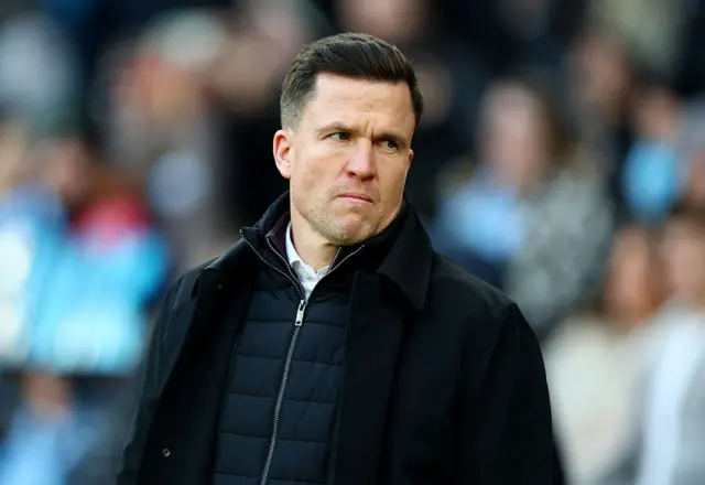 Gary Caldwell looks on