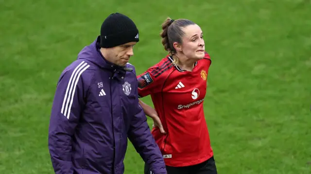 Ella Toone of Manchester United is substituted off following an injury during the Subway Women's League Cup Quarter Final match between Manchester United and Tottenham Hotspur at Progress with Unity Stadium