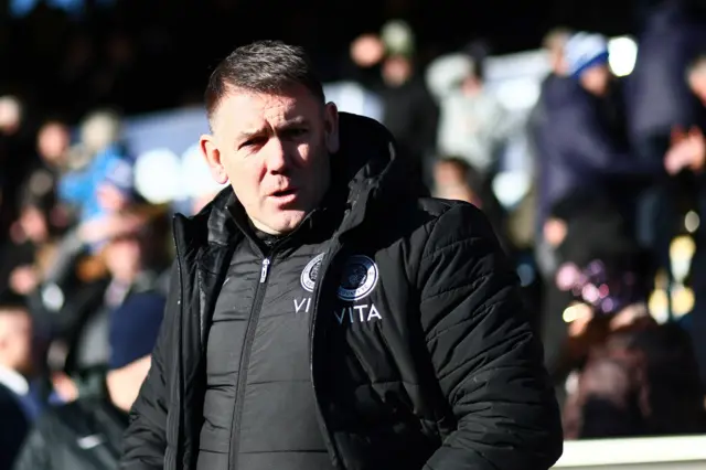 Stockport County boss Dave Challinor looks on from the sidelines