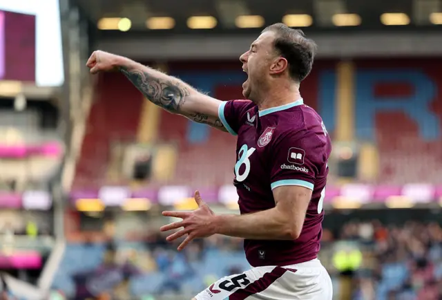 Ashley Barnes celebrates