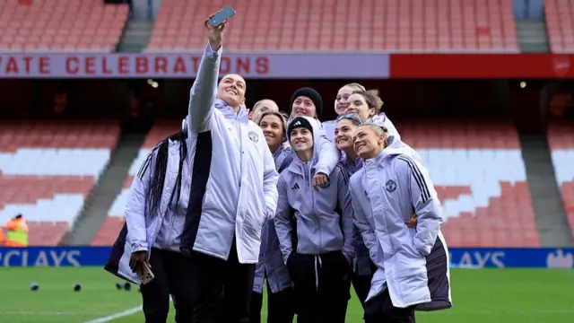 Manchester United players posing for a picture