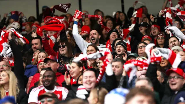 Arsenal supporters celebrating