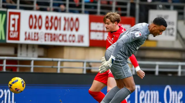 Leyton Orient's Dom Ballard nicks the ball off Cardiff's Nathan Trott to give his side the lead