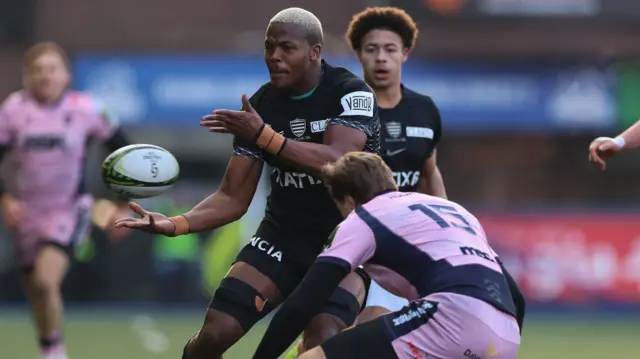 Hacjivah Dayimani of Racing 92 breaks away to set up a try for Selestino Ravutaumada