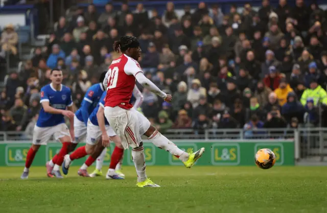 Noni Madueke strikes the ball
