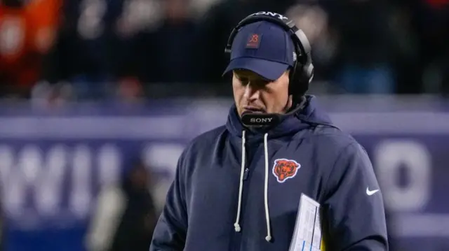 Chicago Bears head coach Ben Johnson stands on the sidelines against the Green Bay Packers