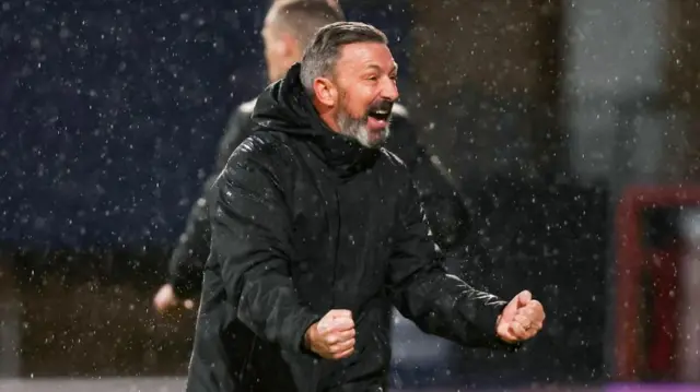 Derek McInnes celebrates Hearts' win over Dundee