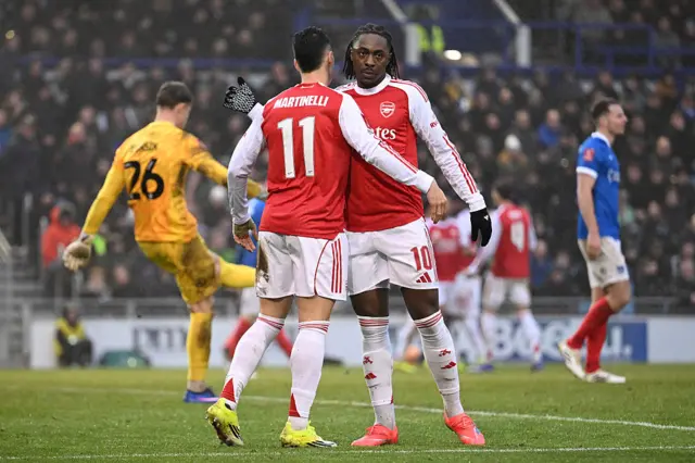 Eberechi Eze celebrates with Gabriel Martinelli