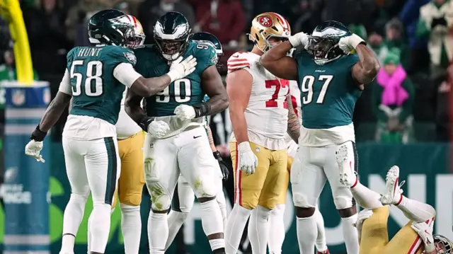Eagles defenders celebrate