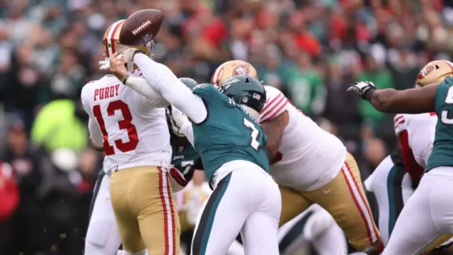 Haason Reddick of the Philadelphia Eagles hits and strip sacks Brock Purdy of the San Francisco 49ers during the NFC Championship game in 2023