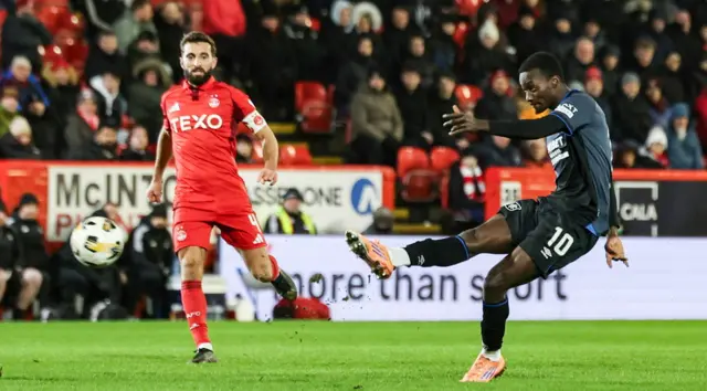 Mo Diomande has a shot at goal from long range
