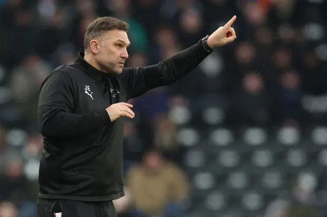 John Eustace instructs his team from the sidelines