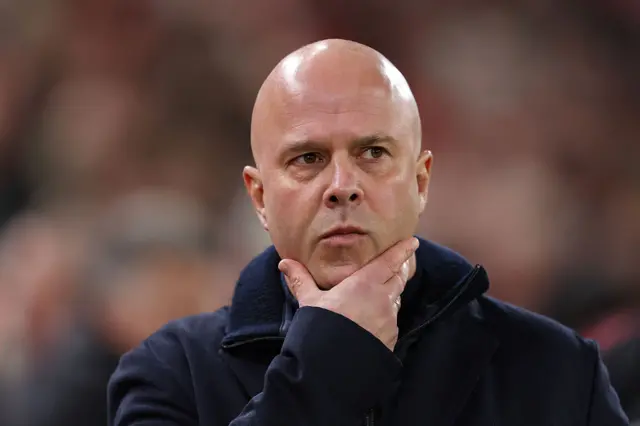 Liverpool head coach Arne Slot looks on