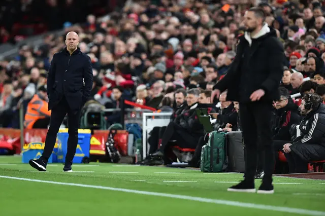 Liverpool manager Arne Slot watches on