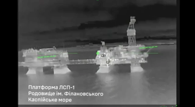 Black and white image taken by a drone of a Russian oil rig in the Caspian sea