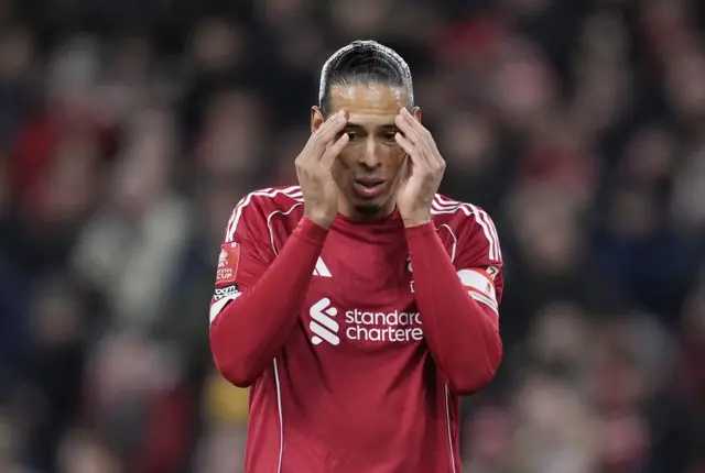 Virgil van Dijk reacts to a near miss