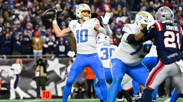 Los Angeles Chargers quarterback Justin Herbert throws a pass against the New England Patriots