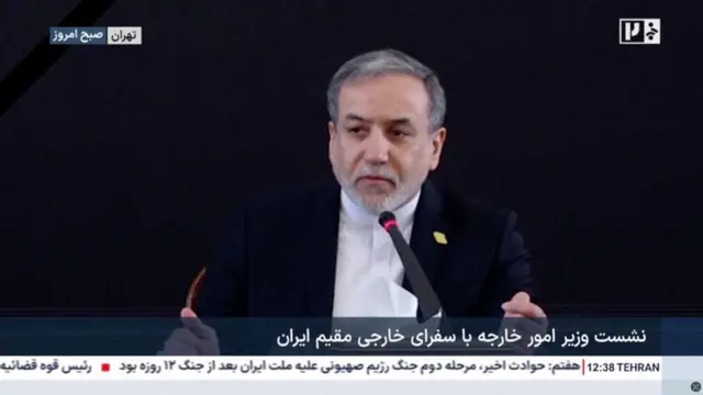 Scrrengrab from Iranian TV of foreign minister giving speech.