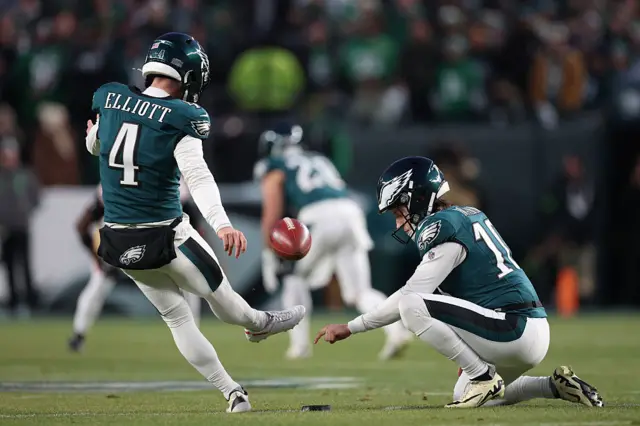 Jake Elliott takes a kick off