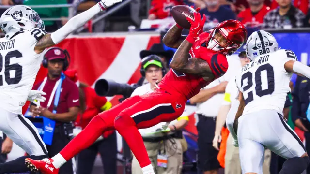 Houston Texans wide receiver Nico Collins catches a pass against the Las Vegas Raiders