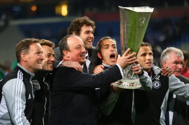 Chelsea Interim Manager Rafael Benitez and his coaching staff pose with the trophy during the UEFA Europa League Final