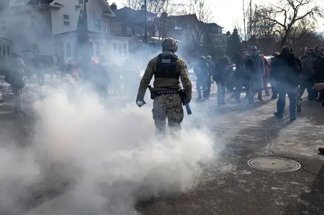 Tear gas has been deployed in Minneapolis as federal agents clash with residents