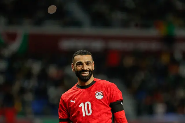 Salah smiles