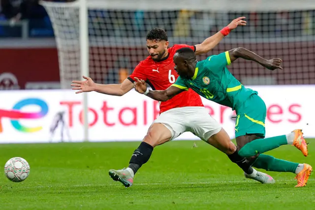 Mane attempts to burst past his full-back