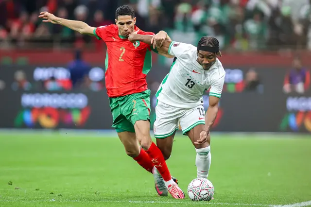 Hakimi battles for the ball with Bruno