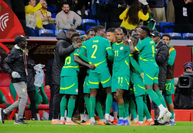 Senegal celebrate their winning goal
