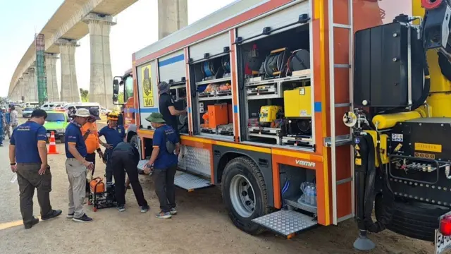 People getting ready beside a truck