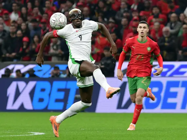 Osimhen tries and fails to control a ball