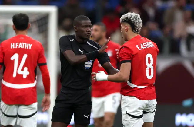 Egypt players protest to the referee