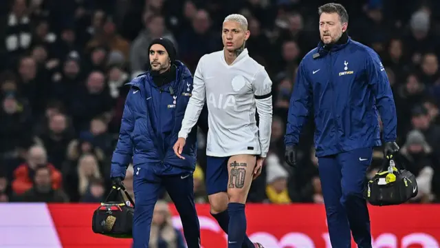 Richarlison walking off injured with Tottenham's medical staff