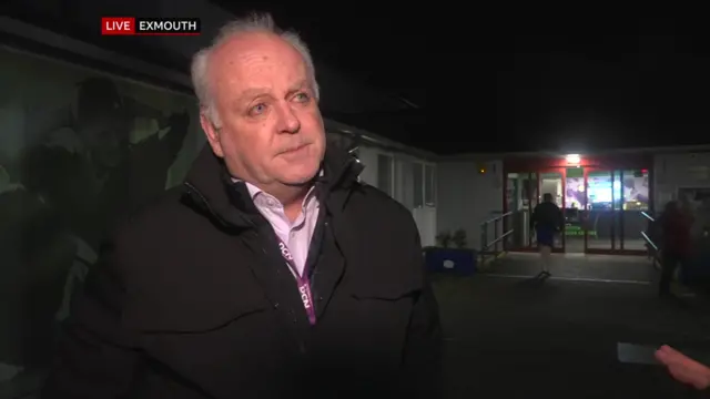 ast Devon District Council leader Paul Arnott speaking on camera