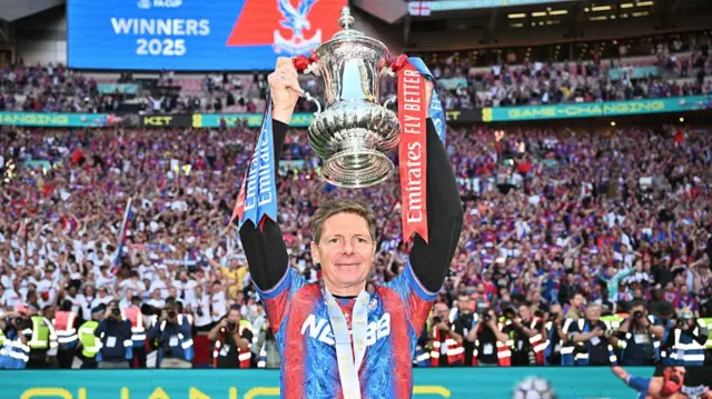 Oliver Glasner lifts the FA Cup above his head