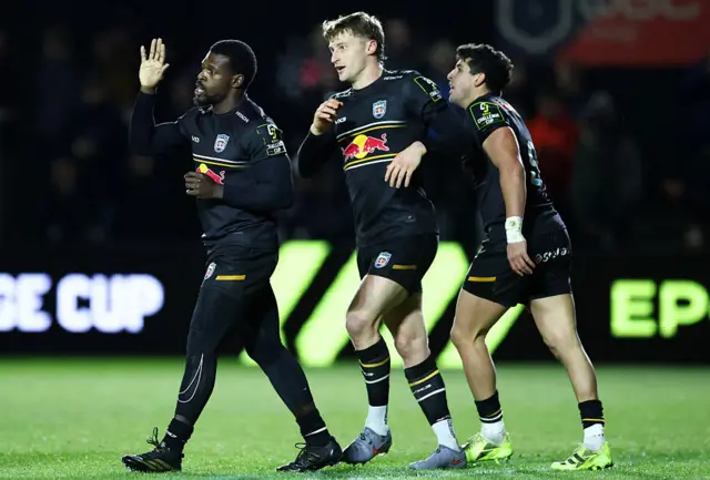 Christian Wade celebrates his try