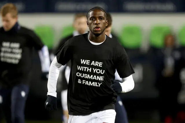 Samuel Iling-Junior of West Bromwich Albion along with the rest of the squad wear T-shirts with a message of support for Ousmane Diakite of West Bromwich Albion who tragically lost his brother earlier this week