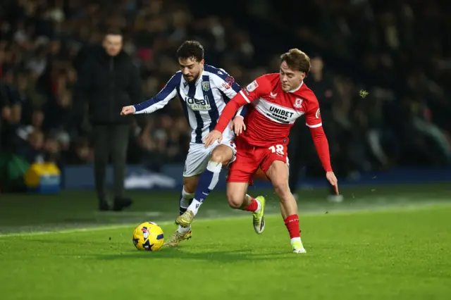Mikey Johnston of West Bromwich Albion and Aidan Morris of Middlesbrough