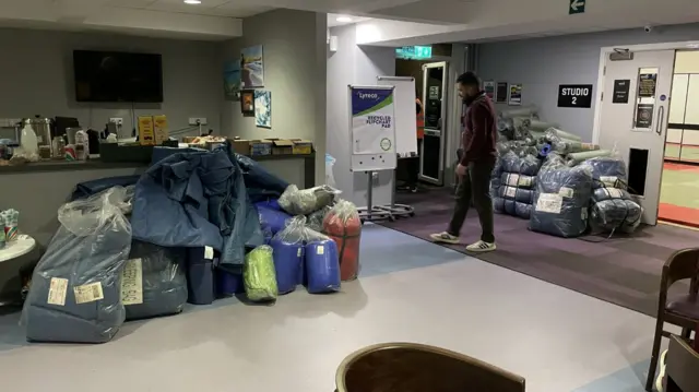 Leisure centre with bedding and supplies in bags