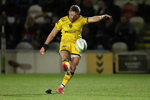 Angus O'Brien takes a kick at goal