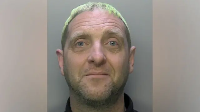 A mugshot of Robert Rhodes