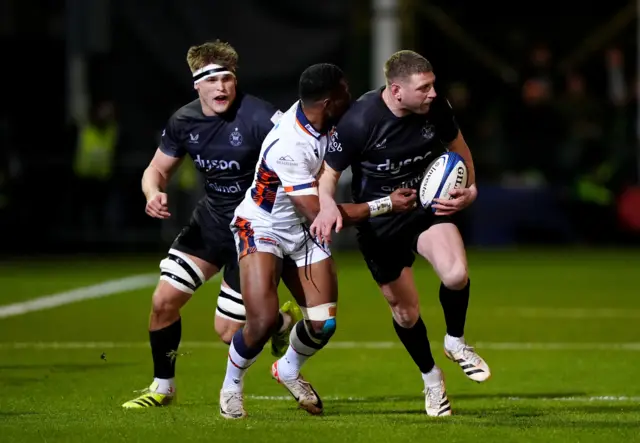 Finn Russell is tackled